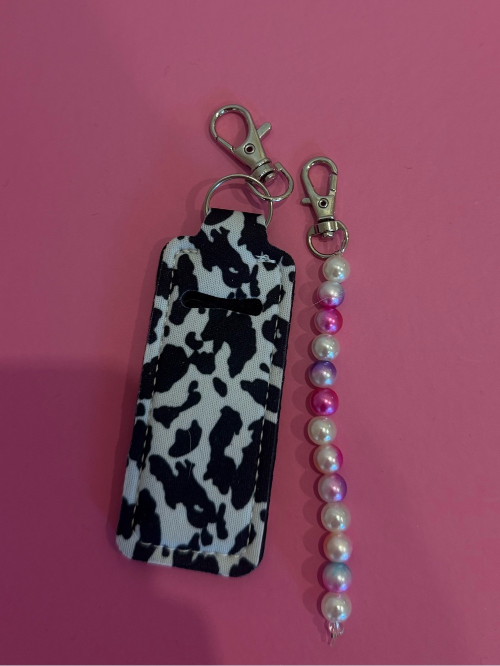 Black & White Cow Print Lip Balm Holder with Pink Pearl Beaded Keychain